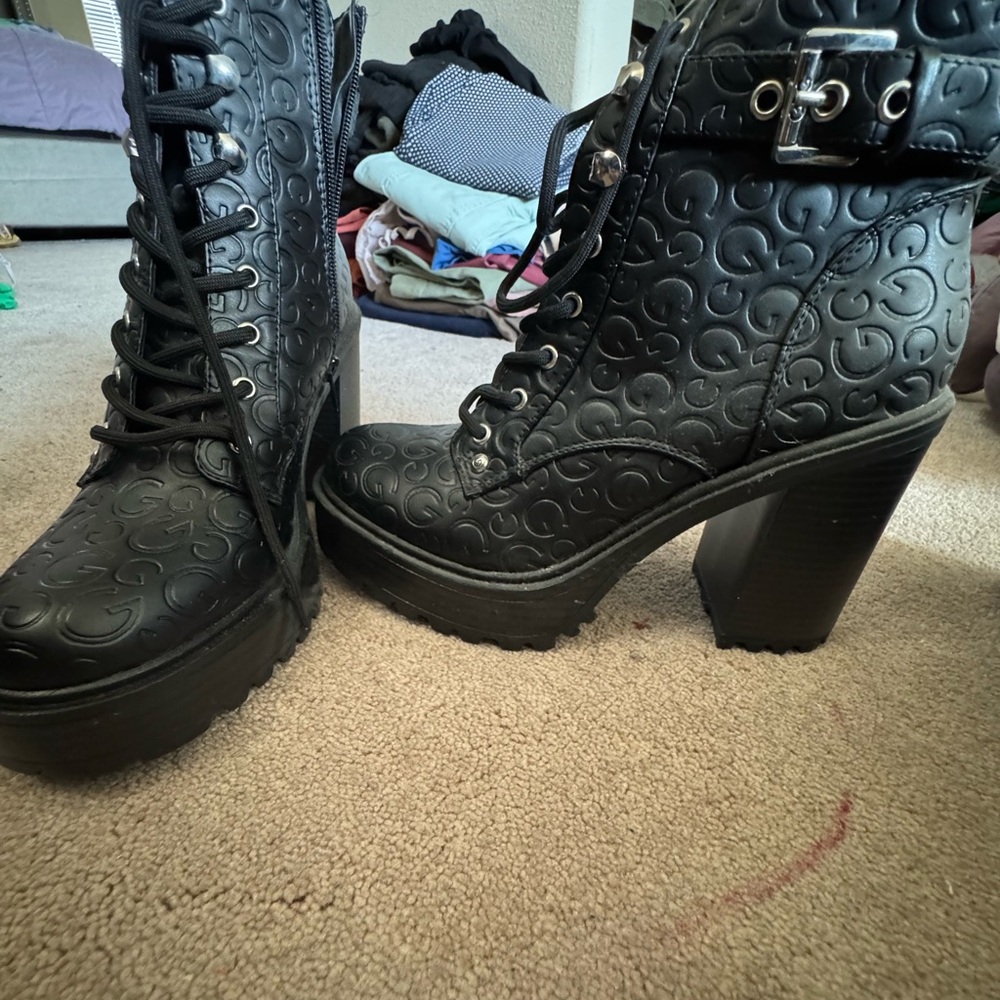 Stylish Black Lace-Up Boots with Embossed Design